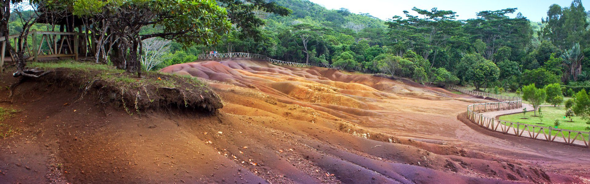 Looking for new discoveries? Opt for a colourful one!  The Seven Coloured Earth located in Chamarel is a sight of wonder. It attracts visitors from all around the globe, and quite understandably so. From a geological perspective, the lands of Chamarel have become a phenomenon which seems intriguing to many people despite scientific explanation of the causes and circumstances.